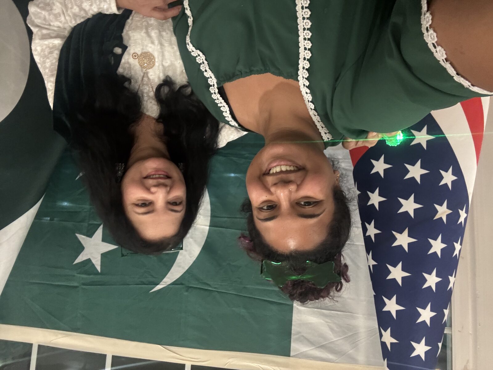 PANI members posing with American and Pakistani flags